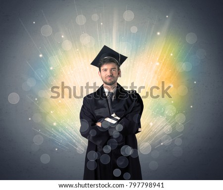 Happy graduate with colorful bokeg lights in the background grunge wall