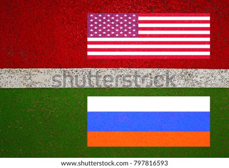American and Russian flag on backgrounds different from the white line
