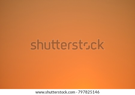 Orange gradient colored blurry wallpaper