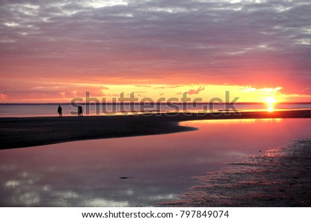 A bright summer sunset over the Baltic Sea.