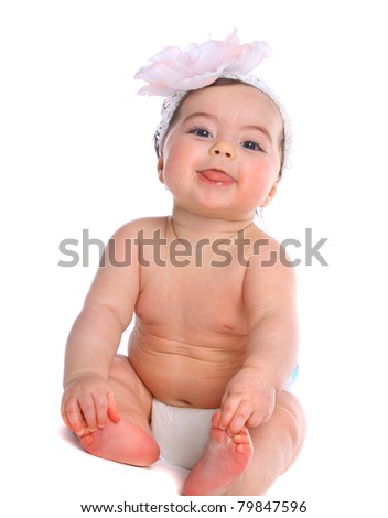 Baby Girl in diapers smirking to the camera