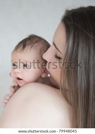 Picture of happy young mother with newborn baby