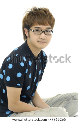 young Casual man sitting on the floor