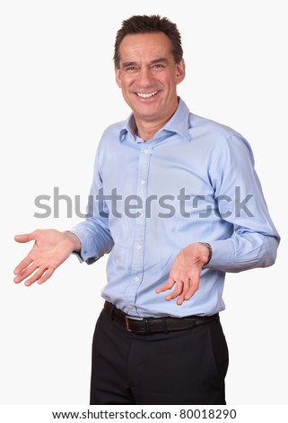 Attractive Smiling Middle Age Man in Blue Shirt with Open Hands Royalty-Free Stock Photo #80018290