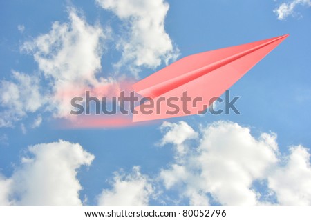 pink air flying in blue sky
