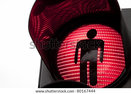 Traffic lights with the red light lit.