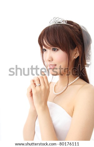 Young Asian woman wearing a wedding dress