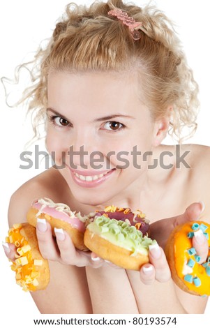 Picture of pretty young woman with sweet donuts  over white