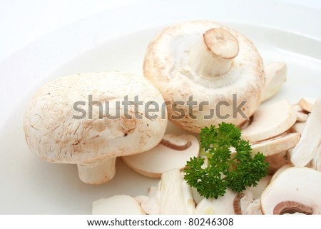 fresh slice champignons mushroom isolated on white background