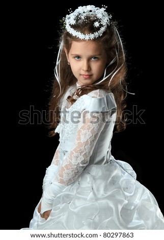 First Communion beautiful girl in white dress