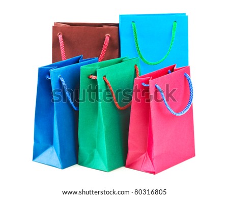Multicolored shopping bags isolated on white background