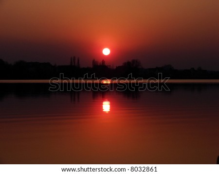 Beautiful sunset above  lake
