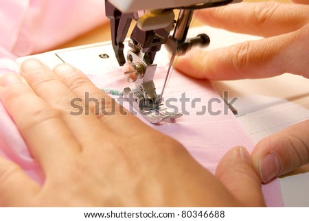 Hand sewing on a machine Royalty-Free Stock Photo #80346688