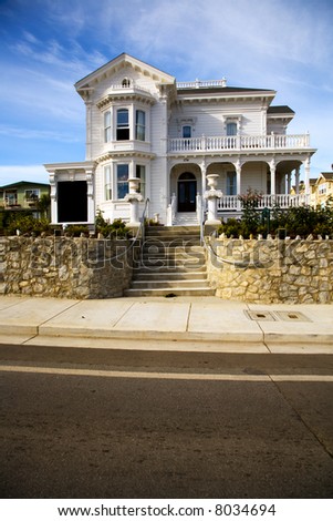 Shot of a white Victorian home located in Sant Cruz, CA