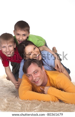 portrait of a prosperous family on a carpet