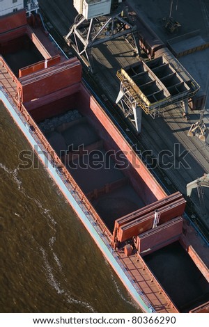 Aerial view over barge at the port