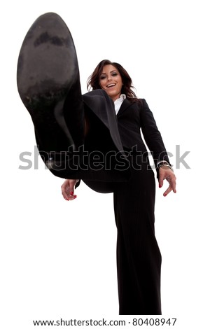 picture of a smiling business woman stepping on something, over white
