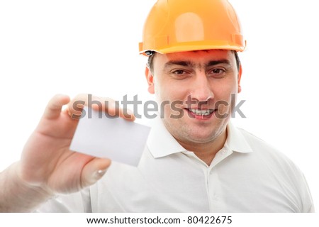 Closeup portrait of adult engineer man holding blank business card