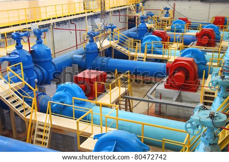 Water pumping station, industrial interior and pipes Royalty-Free Stock Photo #80472742