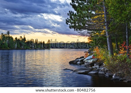 Dramatic sunset and pines at Lake of Two Rivers in Algonquin Park, Ontario, Canada Royalty-Free Stock Photo #80482756