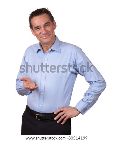 Smiling Middle Age Man in Blue Shirt Holding one hand forward Royalty-Free Stock Photo #80514199