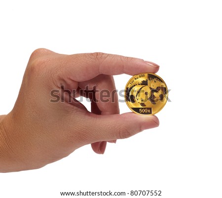 Woman holding coin in hand