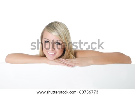 Portrait of woman holding a blank billboard