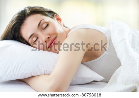 beautiful girl sleeps in the bedroom Royalty-Free Stock Photo #80758018