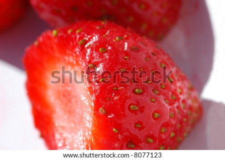 single strawberry in a bowl