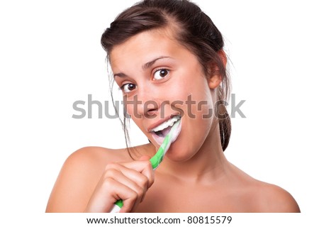 Beautiful Girl Brushing her Teeth