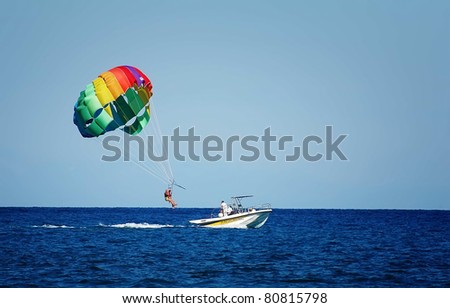 A summer sport - parasailing and boat Royalty-Free Stock Photo #80815798