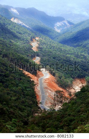 aerial shot of mountain road in vietnam