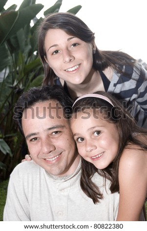 Beautiful Family Enjoying, Mom And Dad Playing With Their Daughter