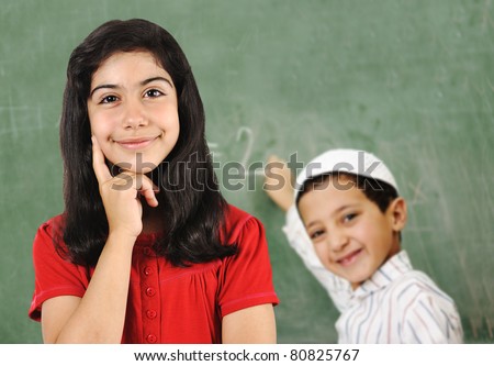School activities on board, girl and boy in classroom