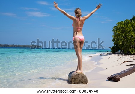 Woman enjoying a stunning beach