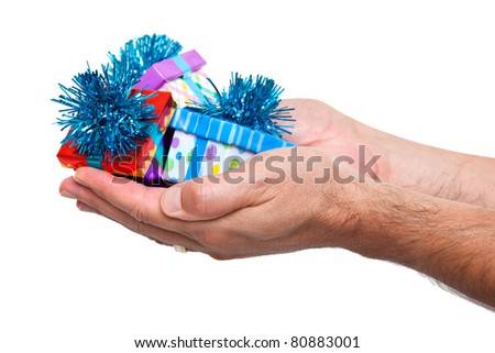 Man's hands holding beautiful gifts