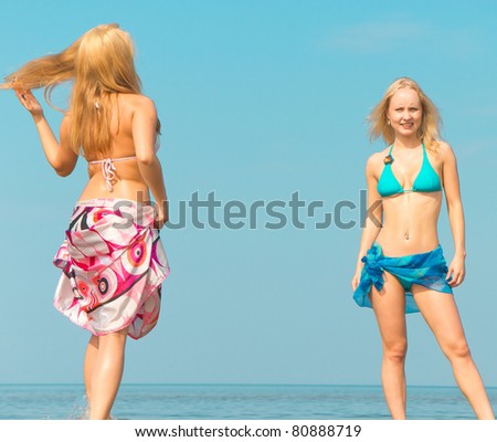 on a Beach Couple In Bikini