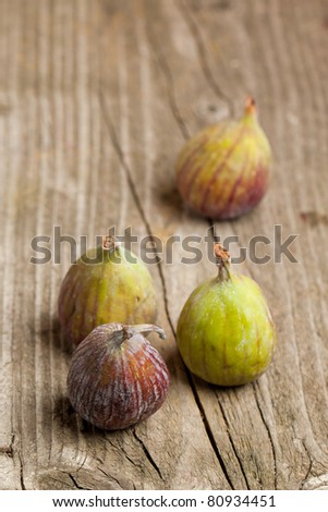 Ripe Fig Fruits on old wooden table