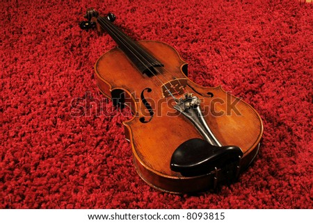 violin on red carpet