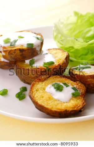 backed potatoes with sour cream and green onions