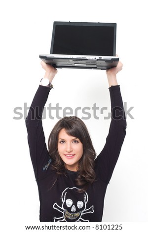 Young brunette girl in black with lap top computer representing modern communications.