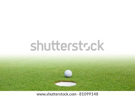 Golf ball on green grass and white background
