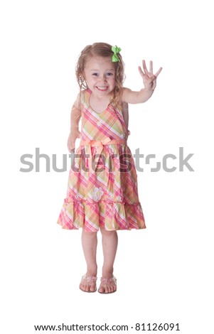 A cute girl hold up four fingers to show that she is four years old.  This image is isolated on white.