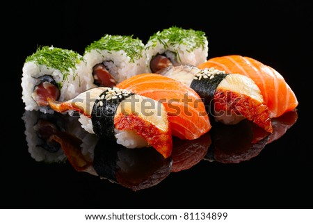 Sushi set on black background Royalty-Free Stock Photo #81134899