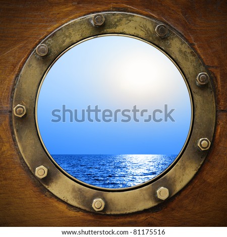Boat porthole with ocean view close up Royalty-Free Stock Photo #81175516