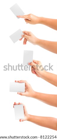 Collection of card blanks in a hand on white background. With save path hand for design work