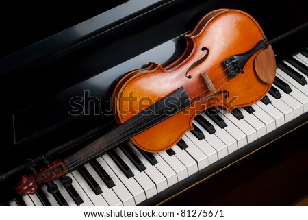 Violin and piano close up Royalty-Free Stock Photo #81275671