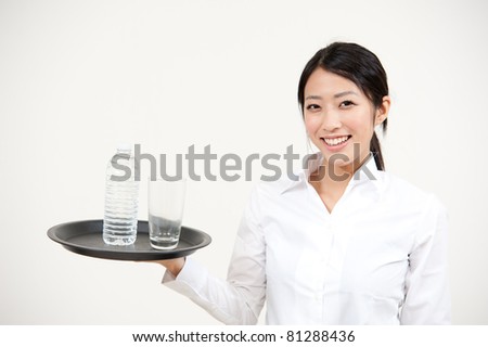 a portrait of asian waitress isolated on white background