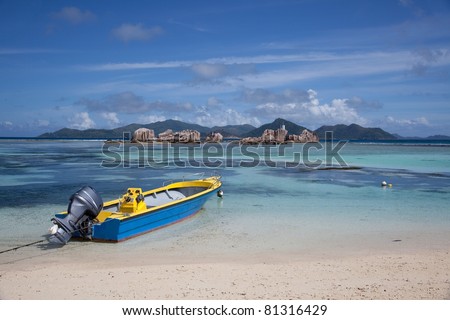 Boat on the beach in Seychelles La Digue island