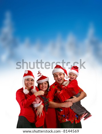 Happy family in Christmas costumes